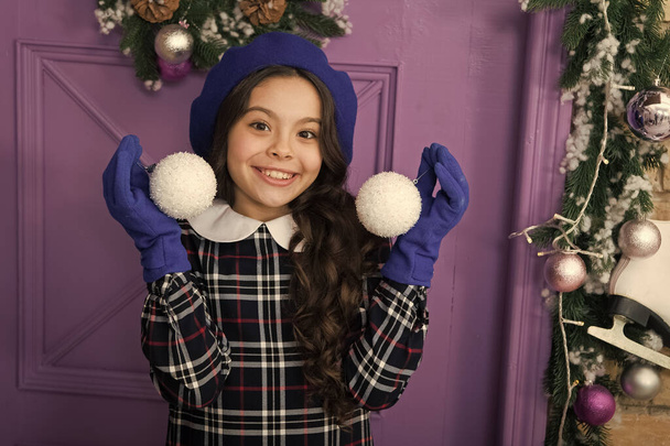home at Christmas. winter holiday activity. season shopping. small french girl. stylish kid decorative xmas ball. decorate home and christmas tree. happy new year. cheerful girl in beret and gloves - Photo, image