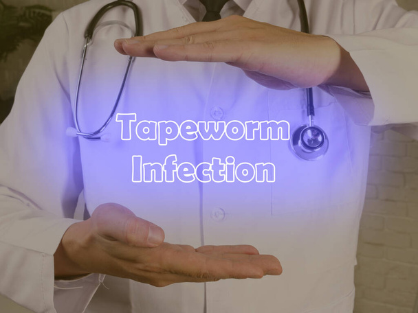 Health care concept about Tapeworm Infection with phrase on the piece of paper - Photo, Image