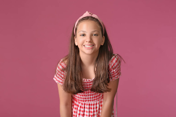 Happy teenage girl on color background - Zdjęcie, obraz