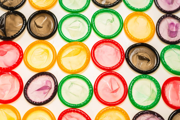 Colorful condoms background. Top view.  - Valokuva, kuva