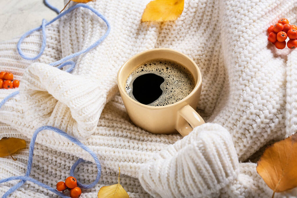 Beautiful autumn composition with clothes and cup of coffee - Photo, Image