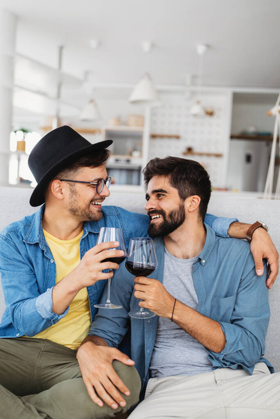 Happy gay couple in love spending time together - Photo, image