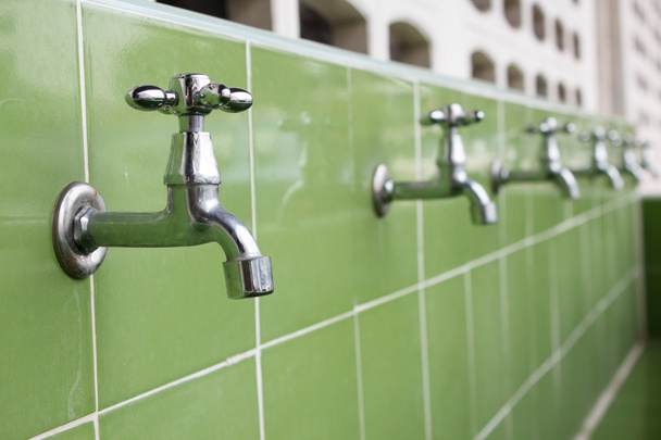  taps outdoor on tiles  - Photo, Image
