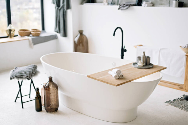 White modern bath in contemporary apartment with stylish loft style interior design, home decor. Soft selective focus. - Fotografie, Obrázek