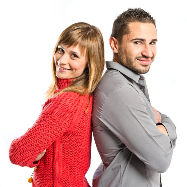 Couple with their arms crossed over isolated background  - Foto, afbeelding