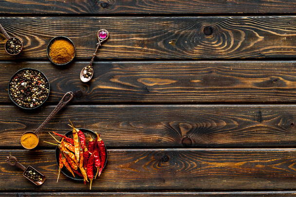 Hot spices and aromatic herbswith cooking utensils overhead - Foto, Imagem
