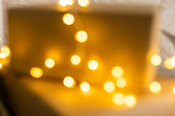 Blur christmas lights on wooden planks, low depth of focus with copyspace - Fotoğraf, Görsel