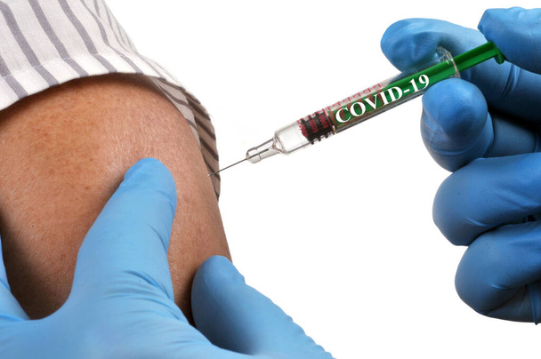Covid-19 vaccination concept on white background  - Photo, Image