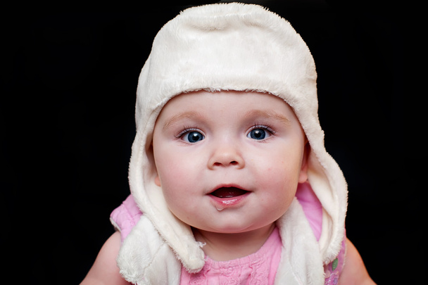 niedliches Baby mit Mütze - Foto, Bild