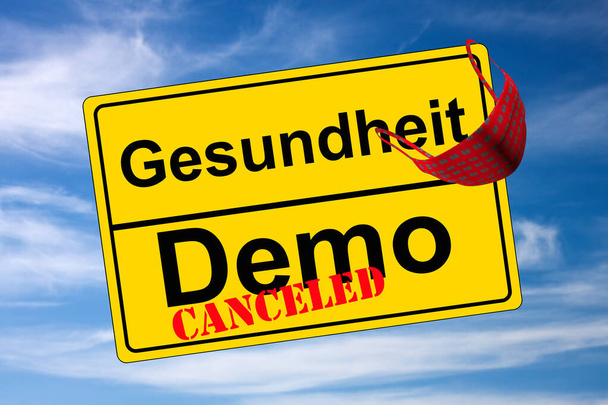 Ortschild auf Himmel Demo anulował kontra Gesundheit - Zdjęcie, obraz
