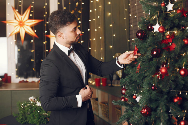 Man in a christmass decorations - Фото, зображення