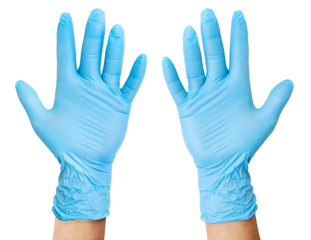 Manos en guantes médicos sobre fondo blanco, aisladas. La vista desde arriba - Foto, Imagen