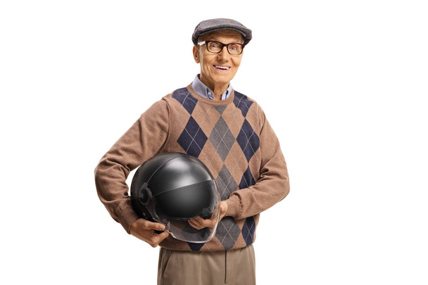Elderly man with holding a helmet isolated on white background - Fotó, kép