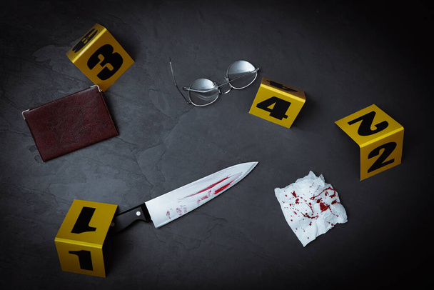 Flat lay composition with evidences and crime scene markers on black background - Foto, Imagem