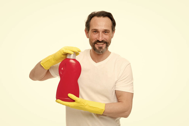 best cleaning company service. mature man ready to clean house. male housekeeper use cleaner. equipped with detergent and gloves. Husband housekeeping and cleaning concept. happy spring cleaning - Zdjęcie, obraz