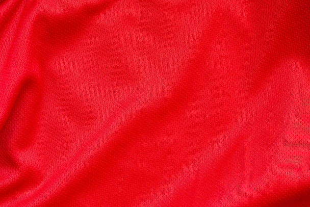 Red sports clothing fabric football shirt jersey texture background - Photo, Image