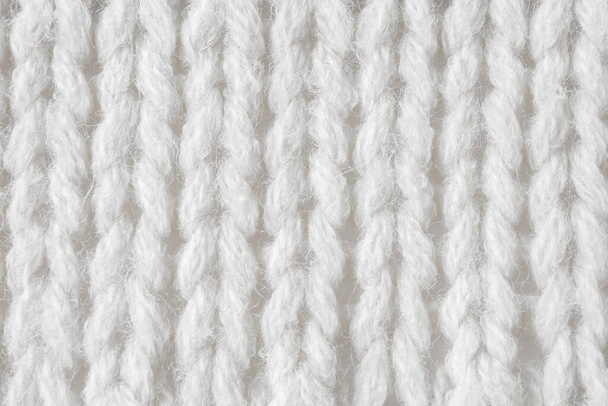 Witte gebreide wol textuur achtergrond - Foto, afbeelding