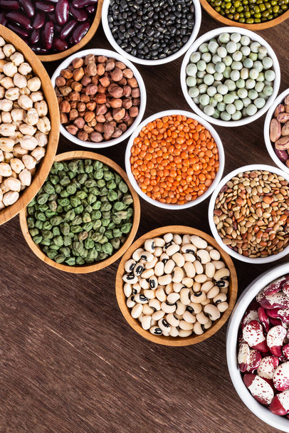Various assortment of indian legumes - beans, chickpeas, lentils, dal top view. Vegetable proteins. Vegan food. Healthy eating concept. - Foto, Imagem