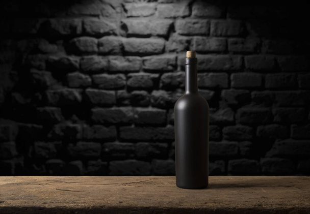 Glass bottle of wine with corks on wooden table background - Zdjęcie, obraz