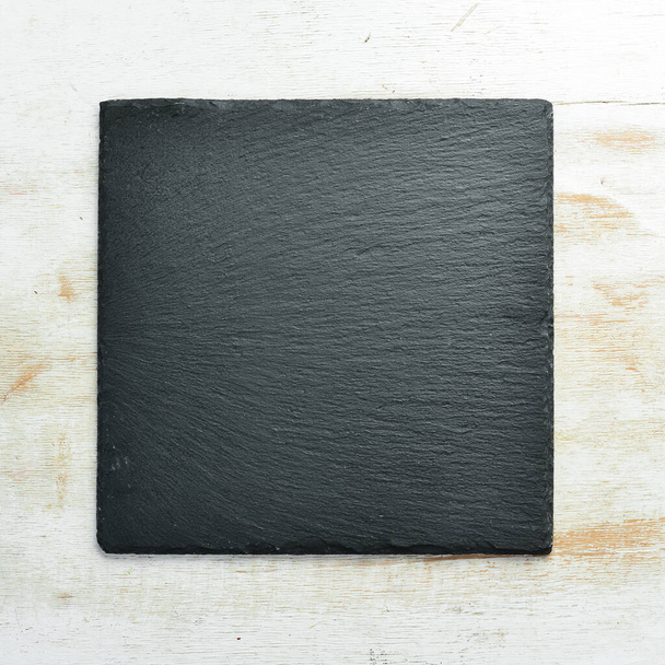 Slate black stone plate. Top view. Free copy space. - Fotó, kép
