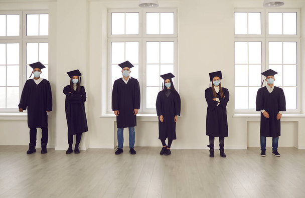 Graduation from university during pandemic concept - Foto, Bild