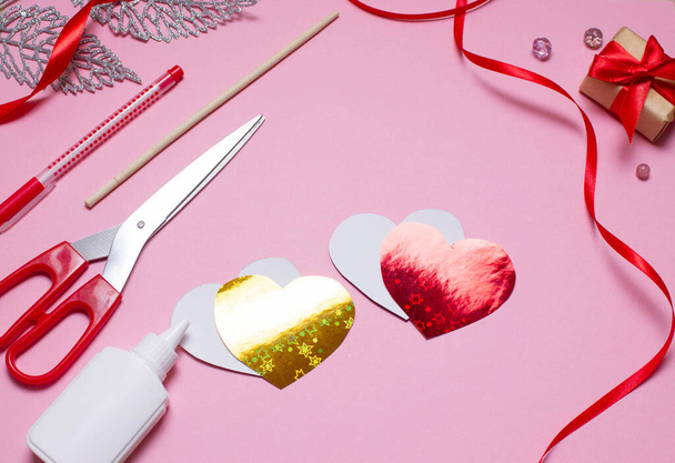 Happy Valentine's Day diy pencil toy step by step. step four glue the heart pieces. - Photo, Image