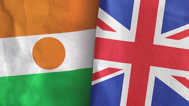 Royaume-Uni et Niger deux drapeaux tissu textile rendu 3D - Photo, image