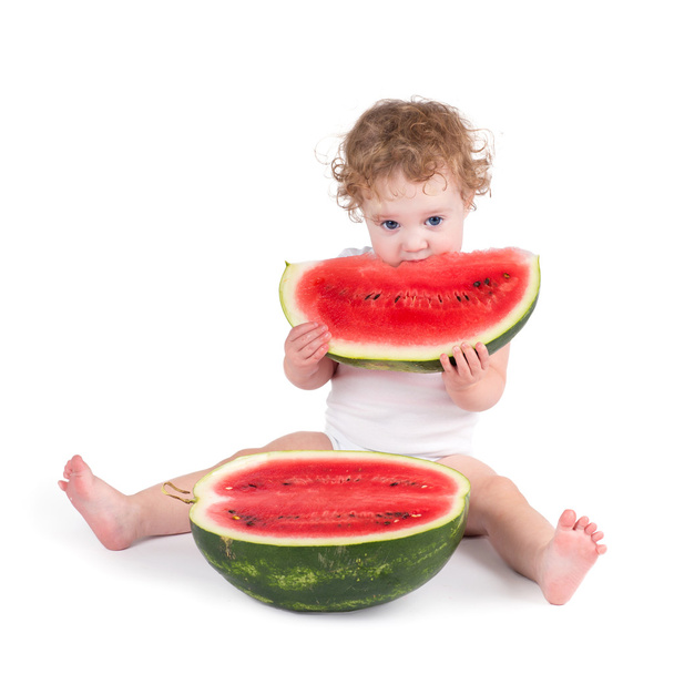 Cute baby eating a watermelon - Photo, Image