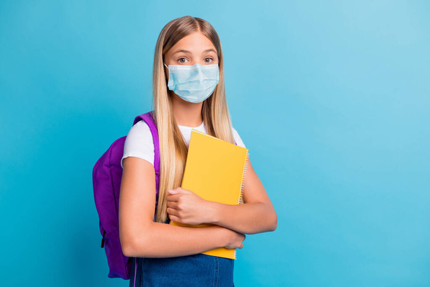 Photo of cool nice girl go to school wear flu cold mask denim dress isolated on pastel blue color background - Zdjęcie, obraz