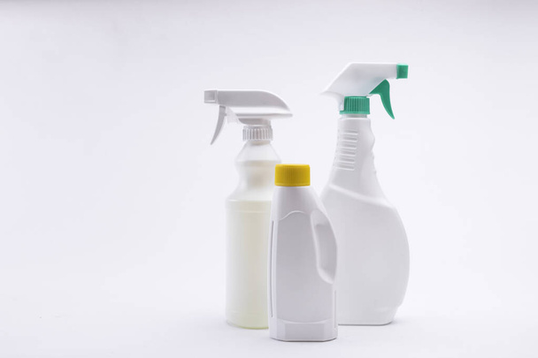 An isolated closeup of spray containers on a white background-concept COVID19 prevention - Foto, afbeelding