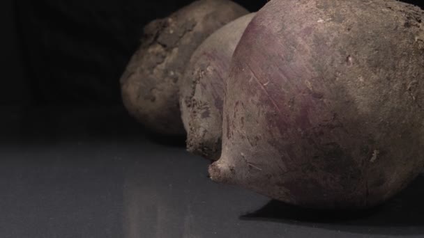 Organic beets close-up. Black background. Fresh vegetables. - Footage, Video