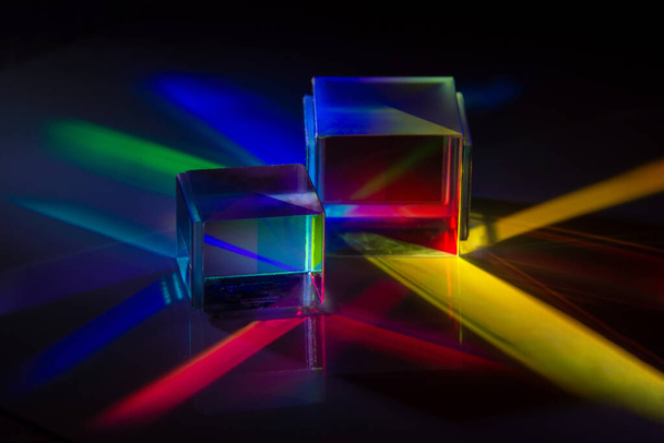 the light spectrum reflected from a crystal cube in many colours - Foto, immagini
