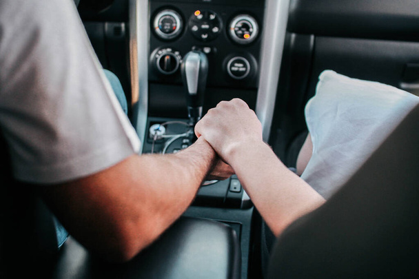 Couple in love hold each other's hands - Φωτογραφία, εικόνα