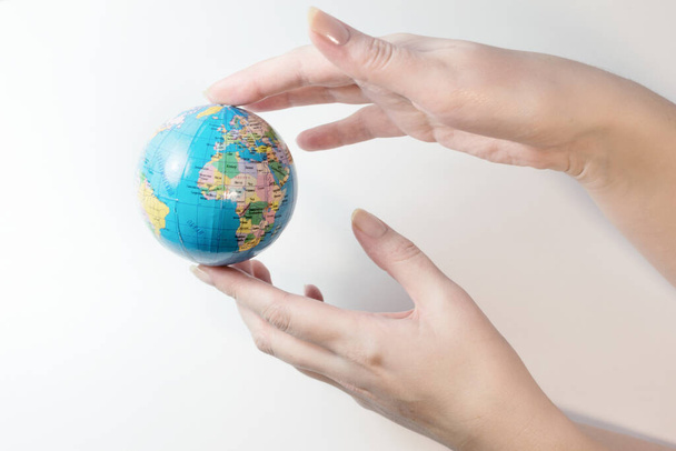  Hold the globe in your hands and protect the planet Earth - Photo, Image
