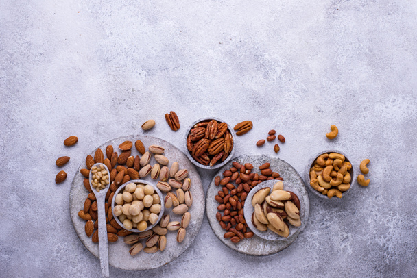 Almonds, pecan, macadamia, pistachio, and cashew - Photo, Image