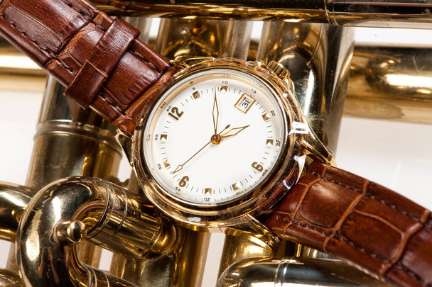 Wristwatch with leather belt on isolated background - Valokuva, kuva