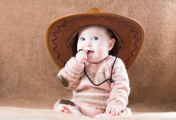 Baby wearing a cow girl outfit - Photo, Image
