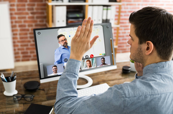 Raising Hand To Ask Questions In Training Video Conference - Fotoğraf, Görsel