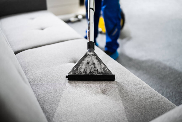Professional Sofa Cleaning Service Using Vacuum Cleaner - Zdjęcie, obraz