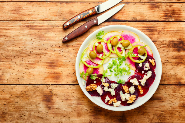 Vegetable salad made from beets,peppers,olives and cheese.Copy space - Photo, image
