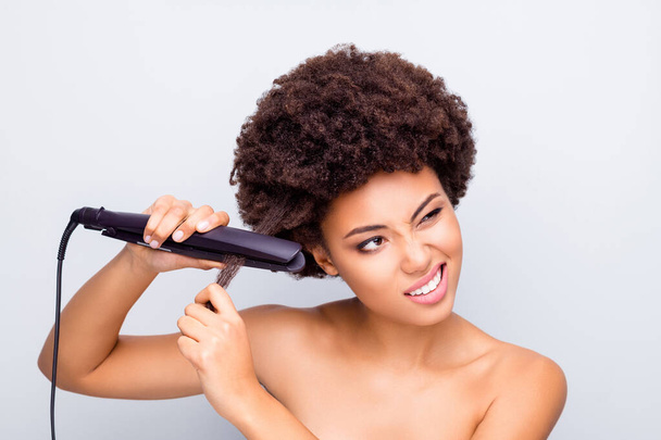 Close-up portrait of her she nice-looking attractive mad irritated wavy-haired girl ironing straightening messy curls keratin therapy treatment isolated on light white gray color pastel background - Fotoğraf, Görsel