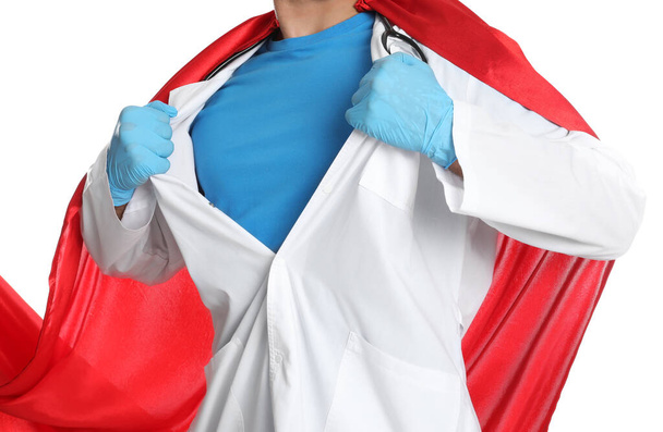 Doctor wearing cape on white background, closeup. Super hero power for medicine - Foto, afbeelding