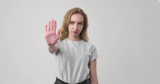 Nainen sanoo ei stop-hand-merkillä - Materiaali, video