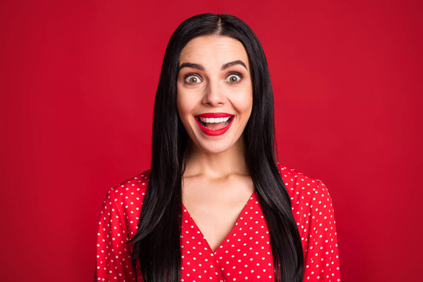 Close-up portrait of nice-looking cheerful amazed lady great news reaction isolated over vibrant red color background - Foto, afbeelding
