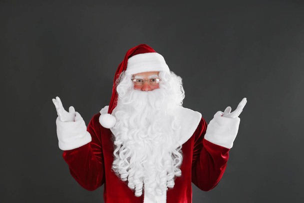 Portrait of Santa Claus on black background - Foto, Bild