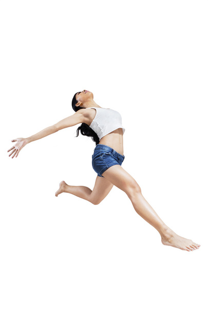 Excited woman jumping on white background - Foto, Imagem