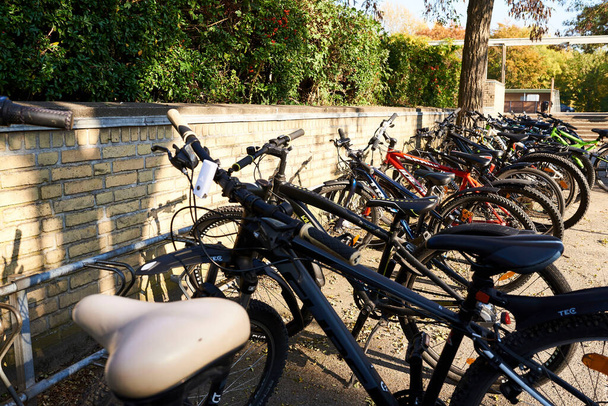 bicycle parking space with bike rack for school children - Fotó, kép