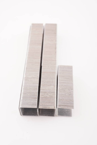 staples for construction stapler on white background - Foto, immagini