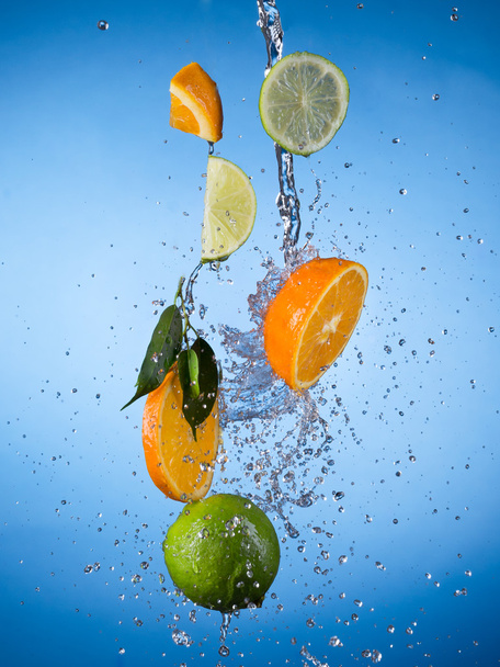 Fruit with water splash - Фото, изображение