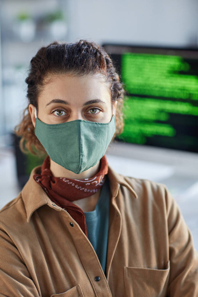 Woman in mask working at office - Photo, Image